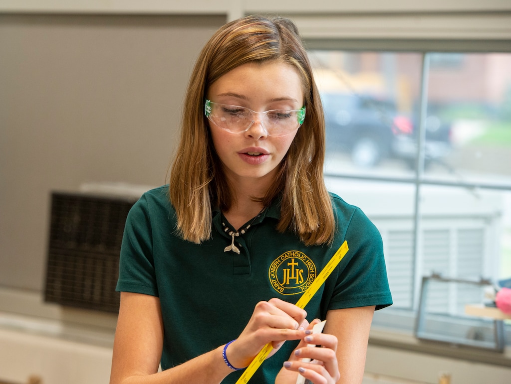 (Rick Egan  |  The Salt Lake Tribune) Mercedes Randhahn demonstrates her project Oct. 22, 2019, in a lab at Saint Joseph Catholic High School.  Randhahn is one of the finalists in a national middle school STEM competition.