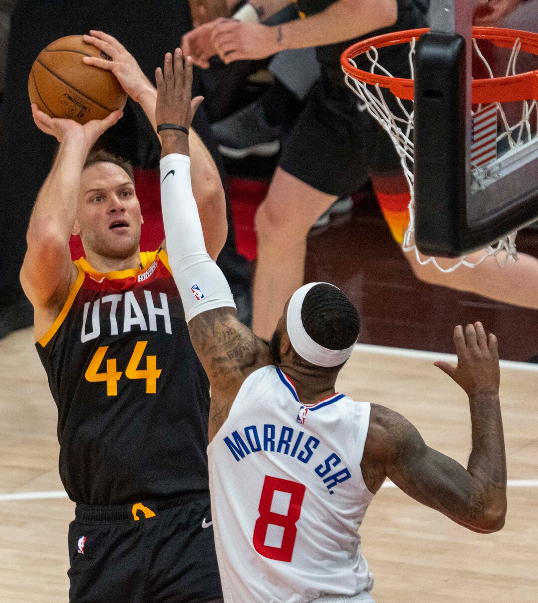 (Rick Egan | The Salt Lake Tribune)  Utah Jazz forward Bojan Bogdanovic (44) shoots over LA Clippers forward Marcus Morris Sr. (8), in second round playoff action in game 2 between the Utah Jazz and the LA Clippers, at Vivint Arena, on Thursday, June 10, 2021.