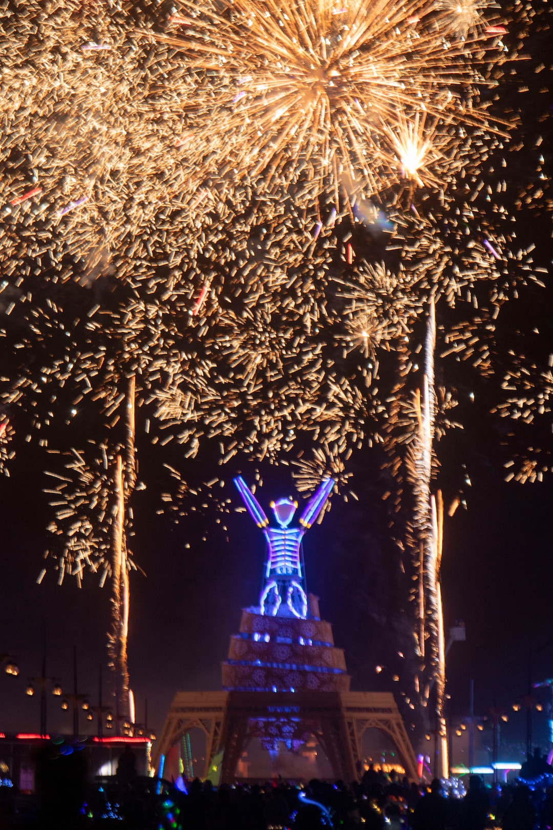 (Rick Egan  |  The Salt Lake Tribune)   Fireworks explode around the man before he burns, Saturday night, at Burning Man, in the Black Rock Desert,  north of Reno, Nevada. The Art Theme this year is Metamorphoses. Saturday, Aug. 31, 2019.