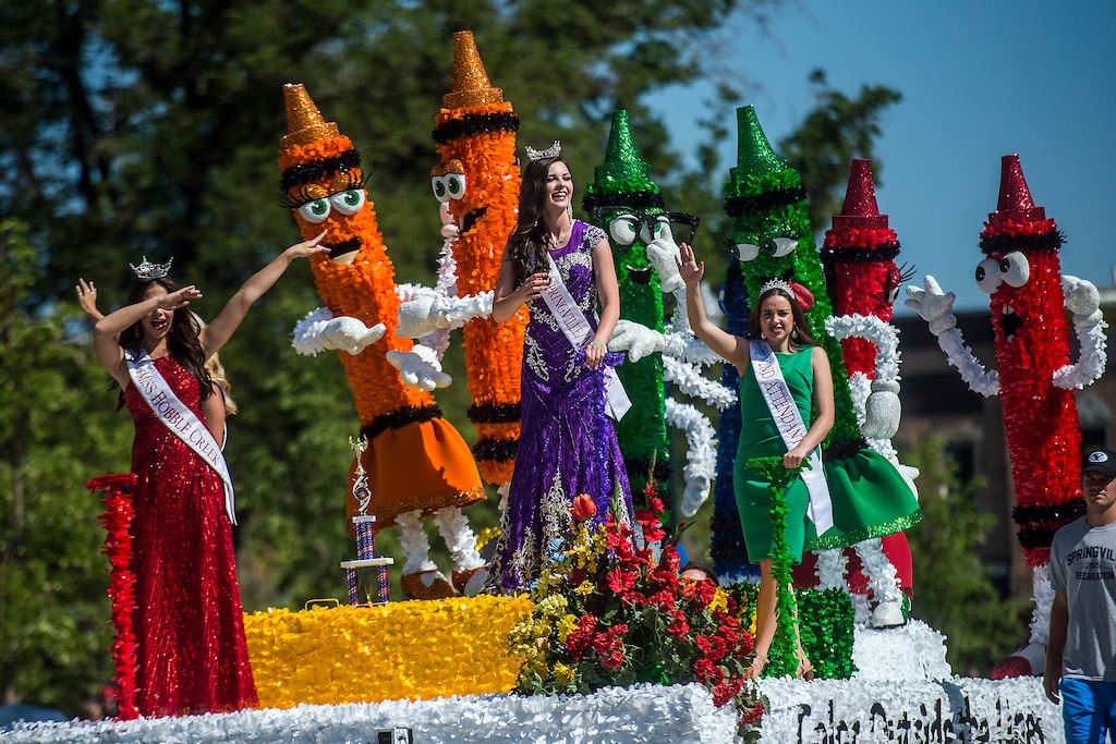 (Chris Detrick  |  Tribune file photo)
The Springville Royalty dab and wave to the crowd during the annual Freedom Festival Grand Parade in downtown Provo Tuesday, July 4, 2017.