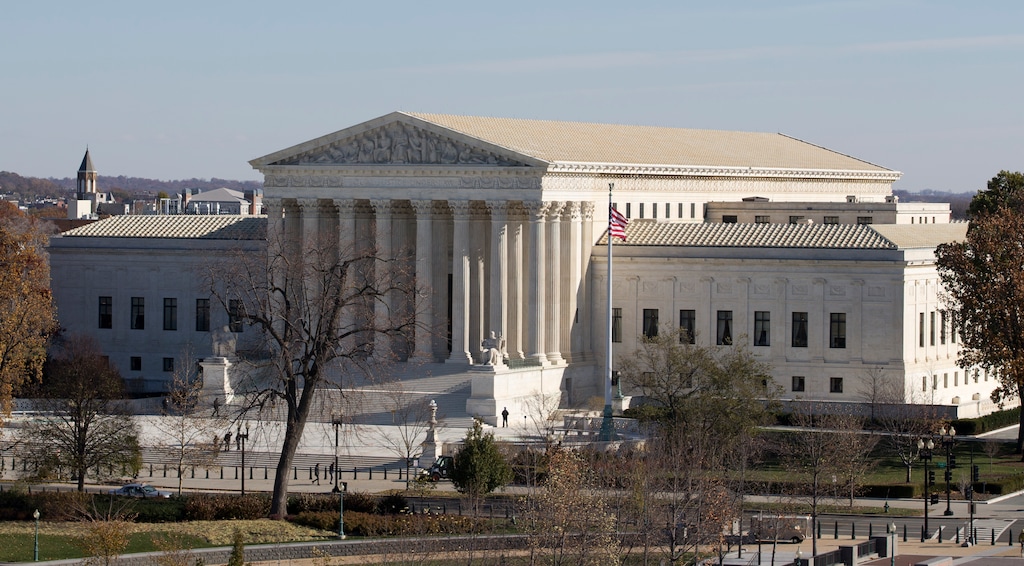 FILE - This Nov. 18, 2014, file photo shows the U.S. Supreme Court in Washington, as seen from the roof of the U.S. Capitol.  (AP Photo/Carolyn Kaster, File)