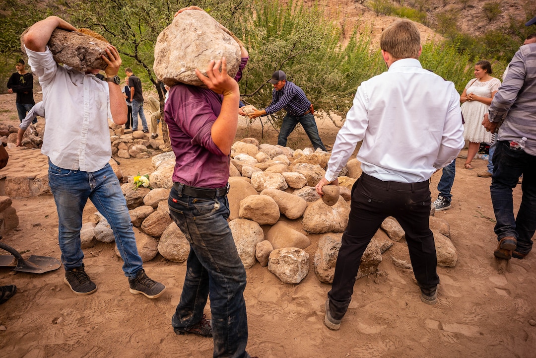 (Trent Nelson  |  The Salt Lake Tribune)
Rocks are stacked on the grave after the funeral for Dawna Langford and two of her children, Trevor and Rogan, in La Mora, Sonora on Thursday, Nov. 7, 2019.