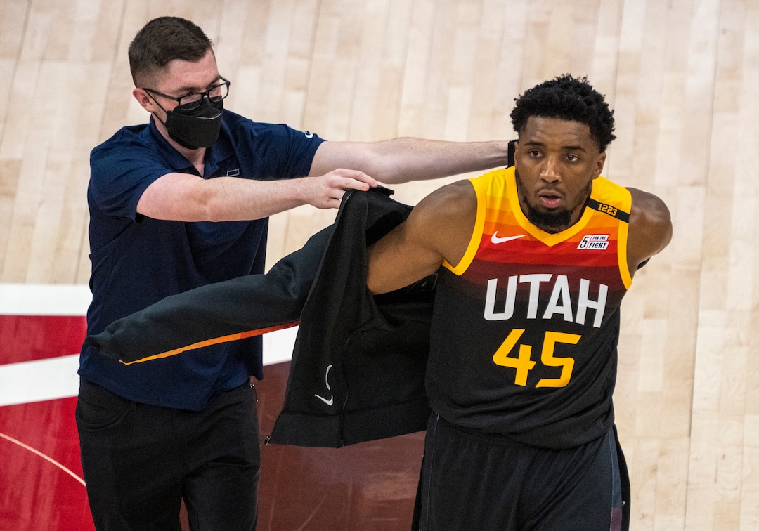 (Rick Egan | The Salt Lake Tribune) Utah Jazz guard Donovan Mitchell (45) removes his warm up jacket as he prepares to play in NBA Playoff game 2, between the Utah Jazz and the Memphis Grizzlies at Vivint Arena, on Wednesday, May 26, 2021.