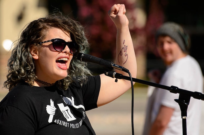 (Trent Nelson | The Salt Lake Tribune)
Utah Against Police Brutality holds a rally in front of West Valley City Hall, Saturday April 21, 2018. Elijah Smith was killed by West Valley Police on April 8 after he ran from them into a home. They shot him in the home's garage, while one hand was in the air and the other, activists say, appeared to be coming up, too. After body camera footage was released, the group began to call for the officer's firing. Jade Arter.
