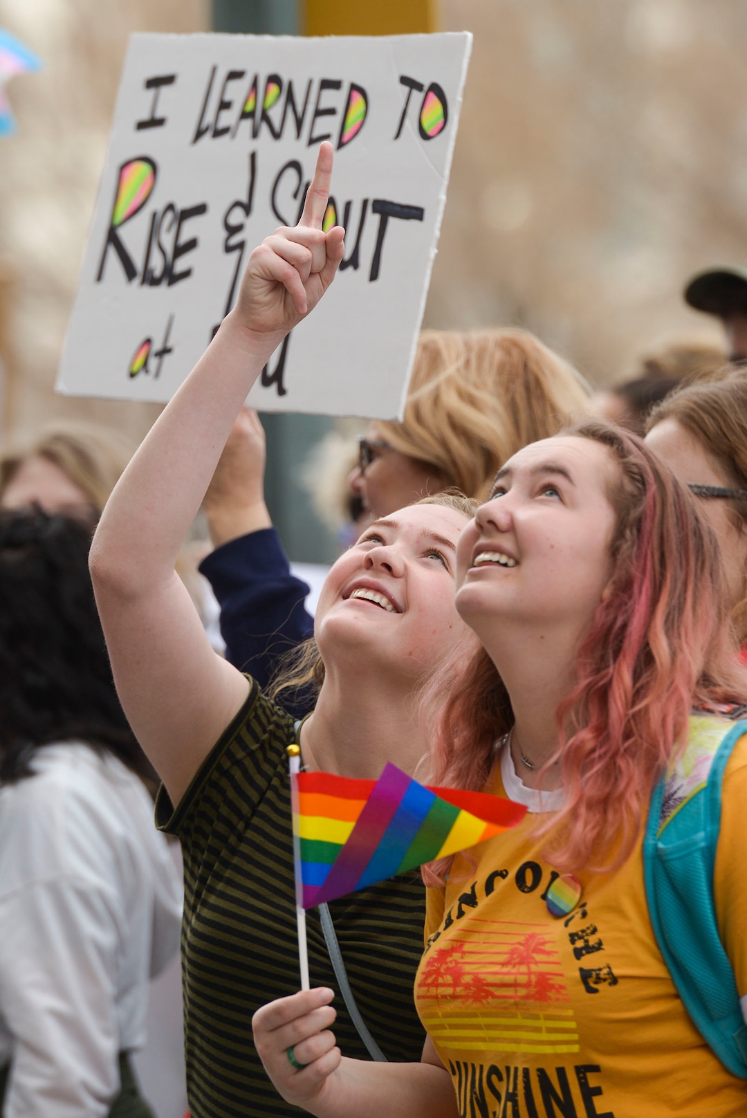 (Leah Hogsten  |  The Salt Lake Tribune)  l-r BYU student Emma Harris is joined by her sister Eliza Harris on Friday. Brigham Young University LGBTQ students took their concerns about the schoolÕs policy reversal regarding romantic behavior by same-sex couples to The Church of Jesus Christ of Latter-day Saints office building, Mar. 6, 2020. Despite removing the section on Òhomosexual behaviorÓ from BYU Honor Code last month, The LDS Church has clarified for the first time that same-sex romantic behavior is still Ònot compatibleÓ with the rules at BYU.