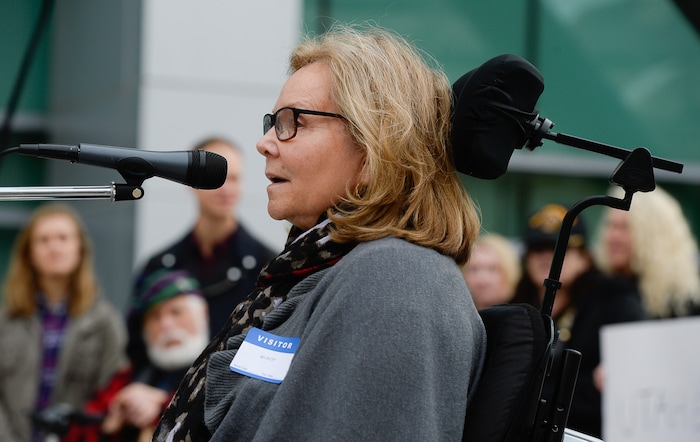(Francisco Kjolseth  |  The Salt Lake Tribune)  Bonnie Mitchell who has Ehlers Danlos Syndrome, an inherited connective tissue disease lends her voice to speak out over the current tax plan being discussed that eliminates the deception for medical expenses and long term care. A group of Utahns gathered to rally at the Wallace Bennett Federal Building in Salt Lake on Monday, Nov. 20, 2017, to tell personal stories of how they might be impacted by the tax reform plans currently on the table in Congress.