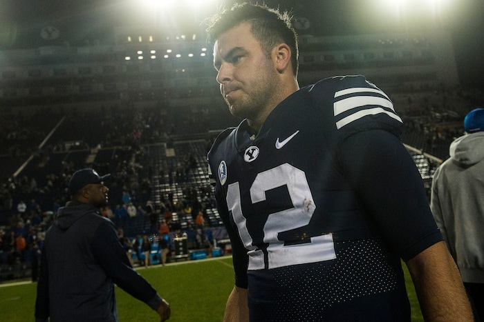 (Chris Detrick  |  The Salt Lake Tribune)  Brigham Young Cougars quarterback Tanner Mangum (12) walks off of the field after the game LaVell Edwards Stadium Friday, October 6, 2017. Boise State Broncos defeated Brigham Young Cougars 24-7.