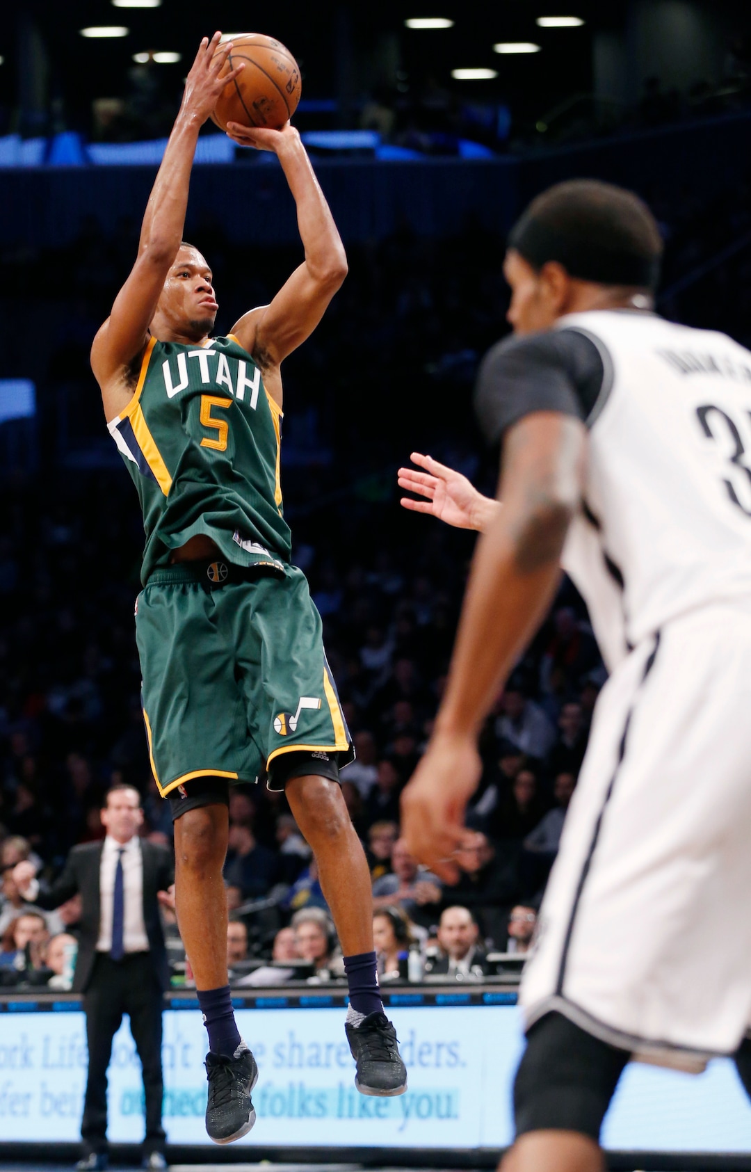Utah Jazz guard Rodney Hood (5) shoots in the second half of an NBA basketball game against the Brooklyn Nets, Monday, Jan. 2, 2017, in New York. The Jazz won 101-89. (AP Photo/Kathy Willens)
