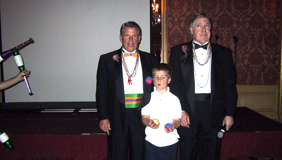 (Trent Nelson | The Salt Lake Tribune) Terry Wood, left, and Tom Barberi, right, dodge flying objects with young juggler Christian Dennison at "An Evening to Remember" for the Alzheimer's Association Utah Chapter in 2004. Barberi died Dec. 24, 2021. He was 78.
