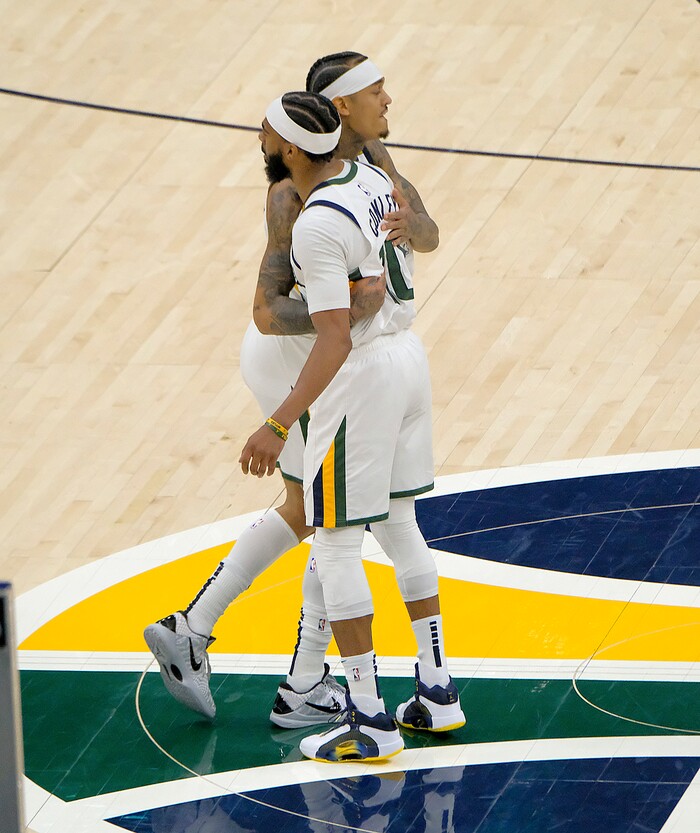 Leah Hogsten | The Salt Lake Tribune Utah Jazz guard Jordan Clarkson (00) hungs Utah Jazz guard Mike Conley (10) after an assist as the Utah Jazz host the Indiana Pacers, April 16, 2021 at the Vivint Arena.