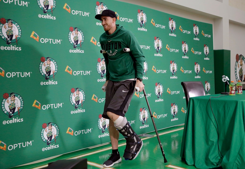 Boston Celtics' Gordon Hayward uses crutches as he steps away from a podium after taking questions from members of the media at an NBA basketball news conference, Thursday, Nov. 2, 2017 at the team's' training facility in Waltham, Mass. Hayward, who broke his ankle about 5 minutes into his NBA career opener at Cleveland on Oct. 17, says he knows he will not play again this season, after needing surgery to repair the injury. (AP Photo/Steven Senne)