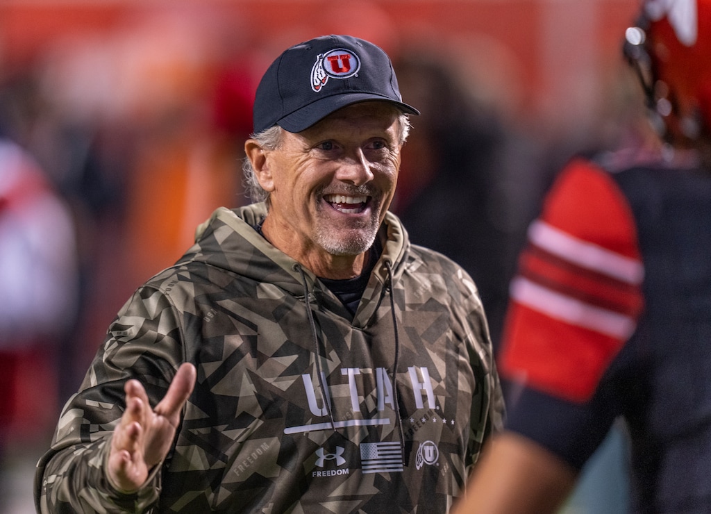 (Rick Egan | The Salt Lake Tribune)  Utah Utes head coach Kyle Whittingham greets Utah quarterback Cameron Rising (7) as he is introduced on Senior Night, before PAC-12 football action between the Utah Utes and the Stanford Cardinal at Rice-Eccles Stadium, on Saturday, Nov. 12, 2022.