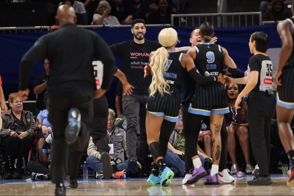 Former NBA player Enes Kanter Freedom is involved in a confrontation with Chicago Sky guard Natasha Cloud on Sunday during a WNBA game in Chicago. (Getty Images via The Athletic).