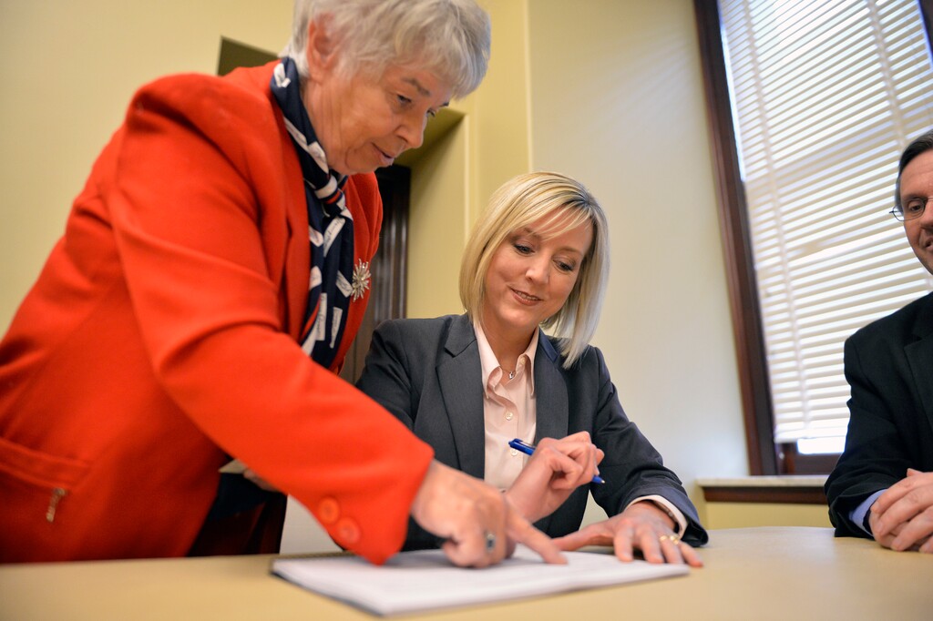 (Chris Samuels | Tribune file photo)  Salt Lake County Councilwoman and gubernatorial candidate Aimee Winder Newton signs a ballot referendum to repeal the recently passed tax reform bill at a press conference at the Utah State Capitol, Monday, Dec. 23, 2019.