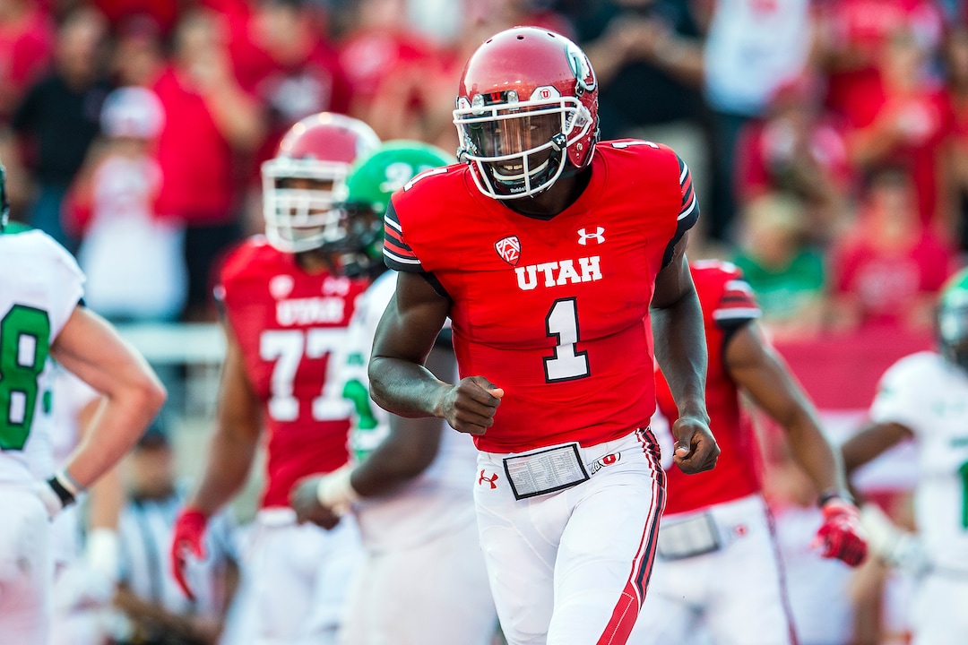(Chris Detrick  |  The Salt Lake Tribune)  Utah Utes quarterback Tyler Huntley (1) celebrates his touchdown during the game at Rice-Eccles Stadium Thursday, August 31, 2017. Utah Utes are leading North Dakota Fighting Hawks 17-9 at halftime. 