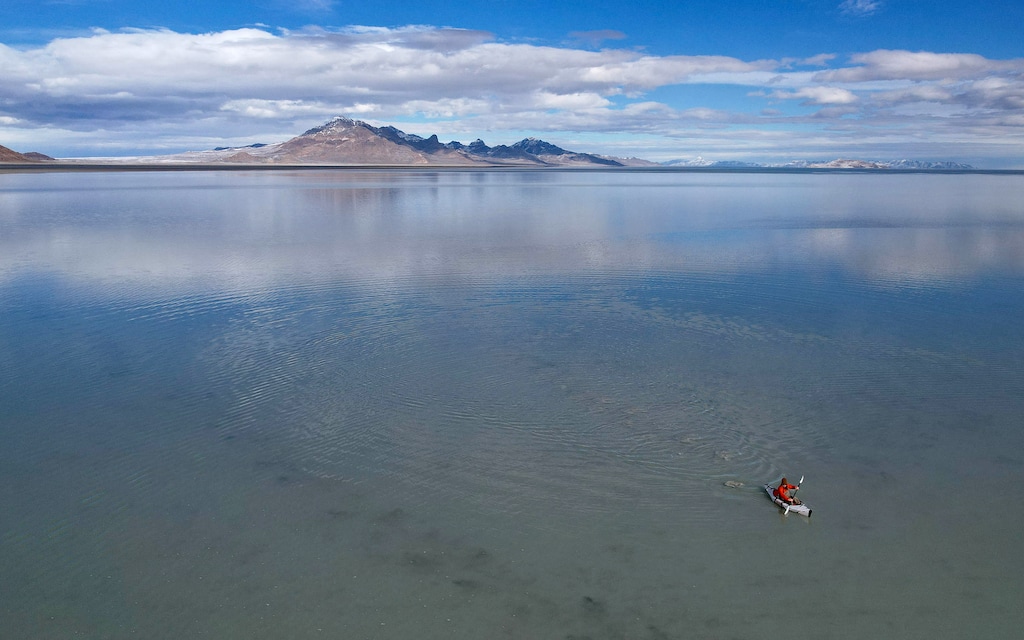(Francisco Kjolseth | The Salt Lake Tribune) The Bonneville Salt Flats, comprised of mostly sodium chloride that forms a hard, white salt crust and home to numerous land speed records, are covered in nine inches of water, forming a shallow lake on Friday, Jan. 27, 2023. The flats are flooded with brine every winter in an effort to get them to regrow, but recent research found the experiment may make things worse.