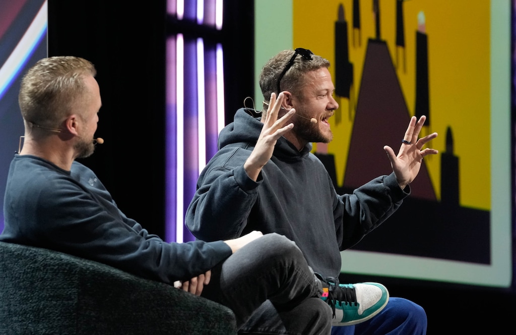 (Francisco Kjolseth | The Salt Lake Tribune) Mac Reynolds, left, joins his brother Dan Reynolds, frontman for Imagine Dragons, for a conversation about gaming and music at the Silicon Slopes Summit in Salt Lake City on Wednesday, Feb. 4, 2026.