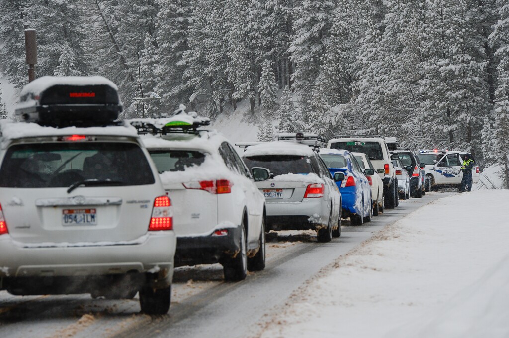(Francisco Kjolseth | The Salt Lake Tribune) Cars get backed up in Big Cottonwood Canyon as crews carry out avalanche control and clear snow further down the road on Tuesday, Dec. 22, 2015.