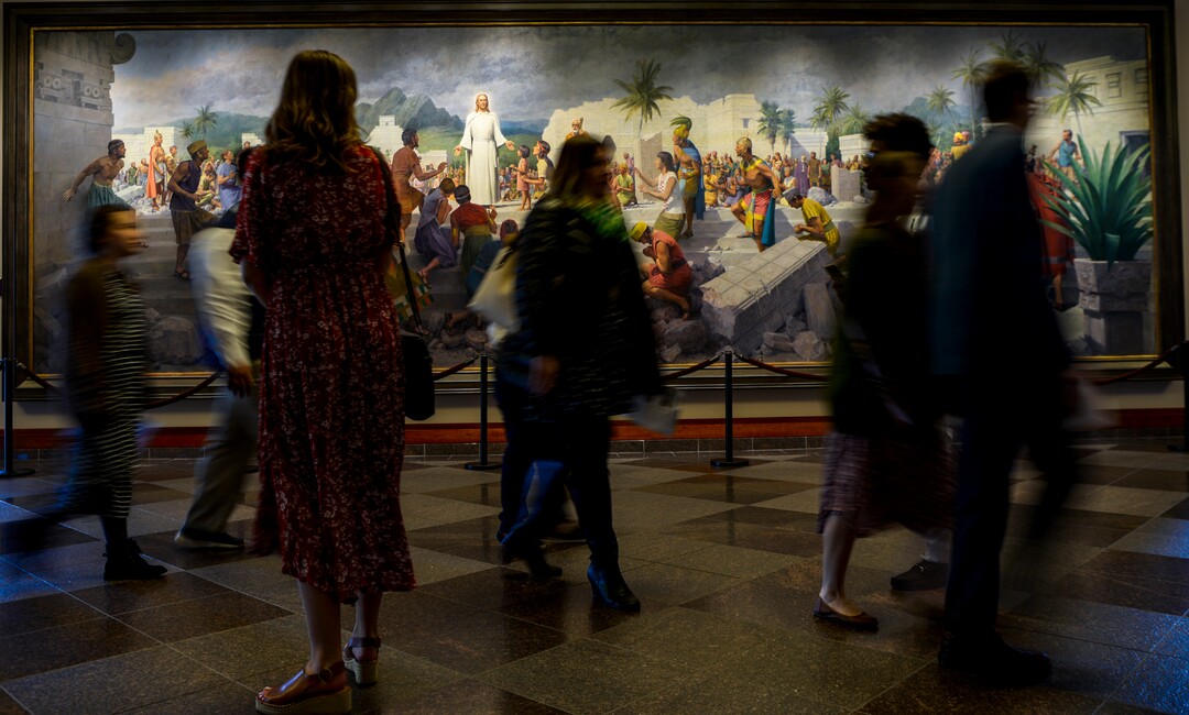 Leah Hogsten  |  The Salt Lake Tribune  Members file into the 189th Annual General Conference of The Church of Jesus Christ of Latter-day Saints in Salt Lake City in front of a painting titled "Jesus Christ Visits the Americas" by John Scott.