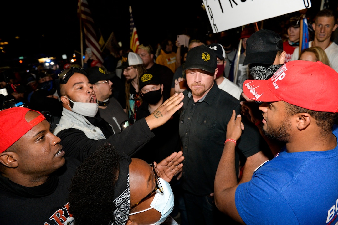 (Leah Hogsten  |  The Salt Lake Tribune) Protesters walk to the University of Utah as Vice President Mike Pence and Sen. Kamala Harris face off in their one and only debate at Kingsbury Hall, Oct. 7, 2020.