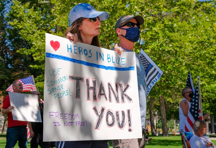 (Leah Hogsten | The Salt Lake Tribune) Supporters of law enforcement gather at Back the Blue rally, Saturday, August 15, 2020 at Washington Square.