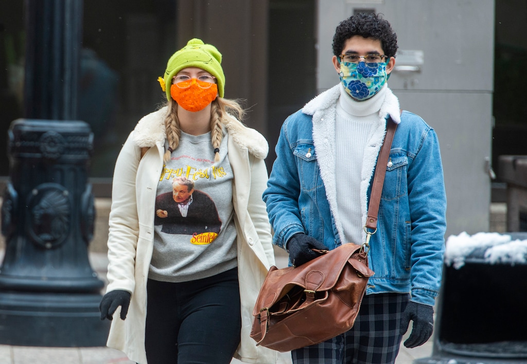 (Rick Egan | The Salt Lake Tribune) Pedestrians wear masks in downtown Salt Lake City, Monday, Nov. 9, 2020.