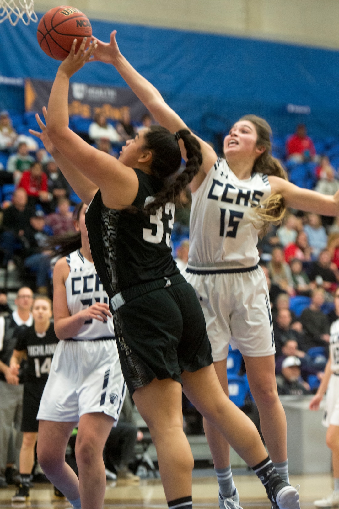 (Rick Egan  |  The Salt Lake Tribune)  Highand High Rams Lana Olevao (33) shoots as Corner Canyon Chargers Kemery Martin (15) defends, in Class 5A women's basketball playoff game between Corner Canyon and Highland, Monday, Feb. 19, 2018.