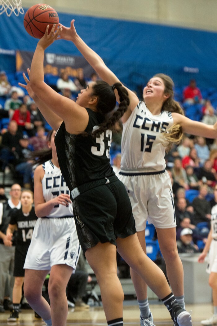 (Rick Egan | The Salt Lake Tribune) Highand High Rams Lana Olevao (33) shoots as Corner Canyon Chargers Kemery Martin (15) defends, in Class 5A women's basketball playoff game between Corner Canyon and Highland, Monday, Feb. 19, 2018.