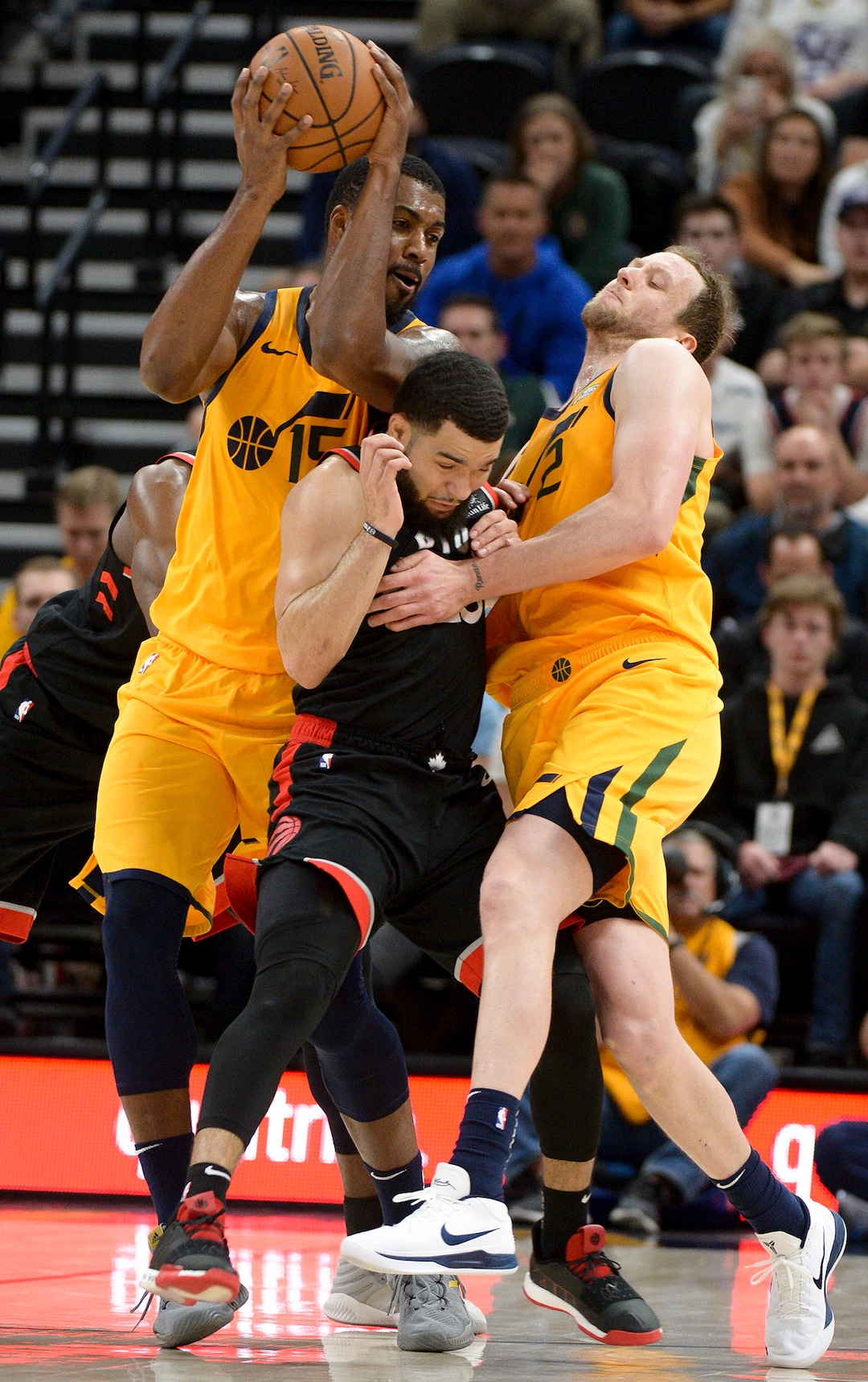 Leah Hogsten  |  The Salt Lake Tribune  Toronto Raptors guard Fred VanVleet (23) is sandwiched between Utah Jazz forward Joe Ingles (2) and Utah Jazz forward Derrick Favors (15) as the Utah Jazz lose to the Toronto Raptors, 111-124, Monday, Nov. 5, 2018 at  Vivint Smart Home Arena.