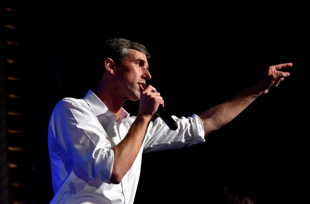 FILE - In this Thursday, Aug. 2, 2018 file photo, Democratic U.S. Senate candidate Beto O'Rourke speaks during a town hall meeting in Abilene, Texas. O'Rourke has come under fire from opponent Republican Sen. Ted Cruz for taking money from what Cruz says is a political action committee in violation of O'Rourke's pledge not to take such donations. O'Rourke has consistently outraised Cruz, including announcing a quarterly $10.4 million fundraising haul last month, despite the attention-grabbing vow to ban PAC money from his campaign coffers. (Ronald W. Erdrich/The Abilene Reporter-News via AP, File)