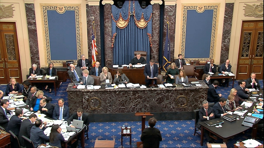 (Senate Television via AP) In this image from video, an amendment from Senate Minority Leader Chuck Schumer, D-N.Y., is read to the Senate during the impeachment trial against President Donald Trump in the Senate at the U.S. Capitol in Washington, Tuesday, Jan. 21, 2020.