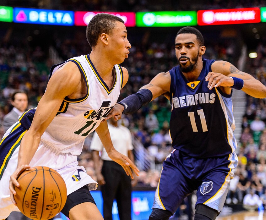 (Trent Nelson  |  The Salt Lake Tribune)
Utah Jazz guard Dante Exum (11) drives on Memphis Grizzlies guard Mike Conley (11) in 2015.