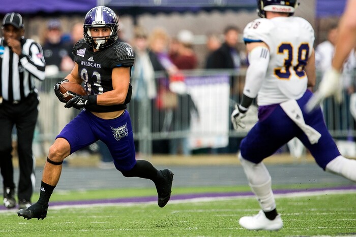 (Chris Detrick  |  The Salt Lake Tribune)  Weber State Wildcats wide receiver David Ames (83) runs past Western Illinois Leathernecks defensive back David Griffith (38) during the game at Stewart Stadium Saturday, November 25, 2017.  