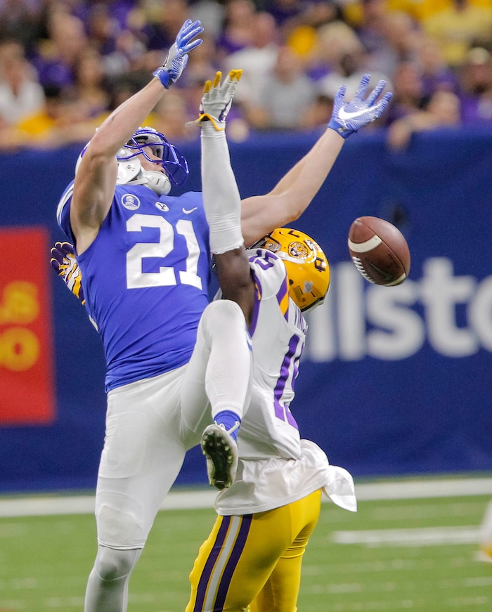 LSU cornerback Kary Vincent Jr. (15) breaks up a pass intended for BYU wide receiver Talon Shumway (21) during the second half of an NCAA college football game in New Orleans, Saturday, Sept. 2, 2017. (AP Photo/Scott Threlkeld)