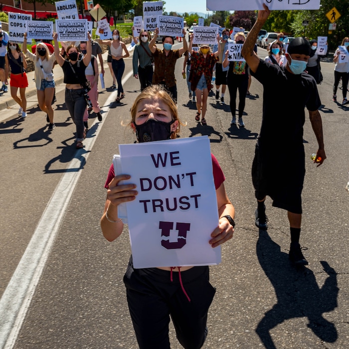 (Trent Nelson | The Salt Lake Tribune) Protesters march at the University of Utah in Salt Lake City on Thursday, Sept. 3, 2020. The protest called for President Ruth Watkins to resign and for the campus police department to be dissolved..