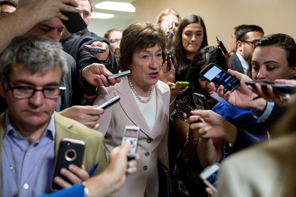 (AP Photo | Andrew Harnik) Sen. Susan Collins, R-Maine is pursued by reporters as she arrives on Capitol Hill in Washington, Tuesday, July 18, 2017.