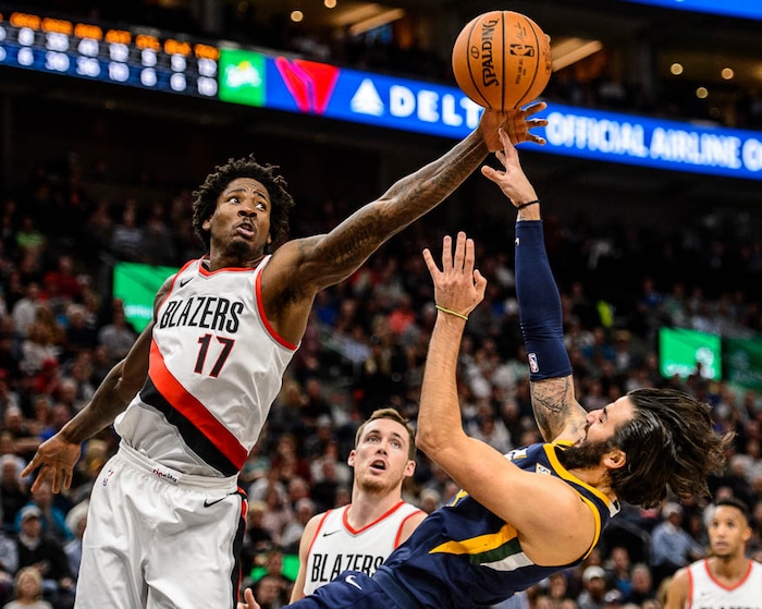 (Trent Nelson | The Salt Lake Tribune)  Portland Trail Blazers forward Ed Davis (17) knocks the ball away from Utah Jazz guard Ricky Rubio (3) as the Utah Jazz host the Portland Trail Blazers, NBA basketball in Salt Lake City, Wednesday November 1, 2017.
