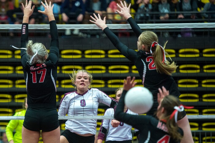 (Chris Detrick  |  The Salt Lake Tribune)  Morgan's Marcie Stapley (9) spikes past North Sanpete's Aubree Ison (17) North Sanpete's Madisyn Allred (20) and North Sanpete's Allyssa Ericksen (4) during the the 3A volleyball state championships at the UCCU Center at Utah Valley University Thursday, October 26, 2017.  Morgan defeated North Sanpete 3-0.
