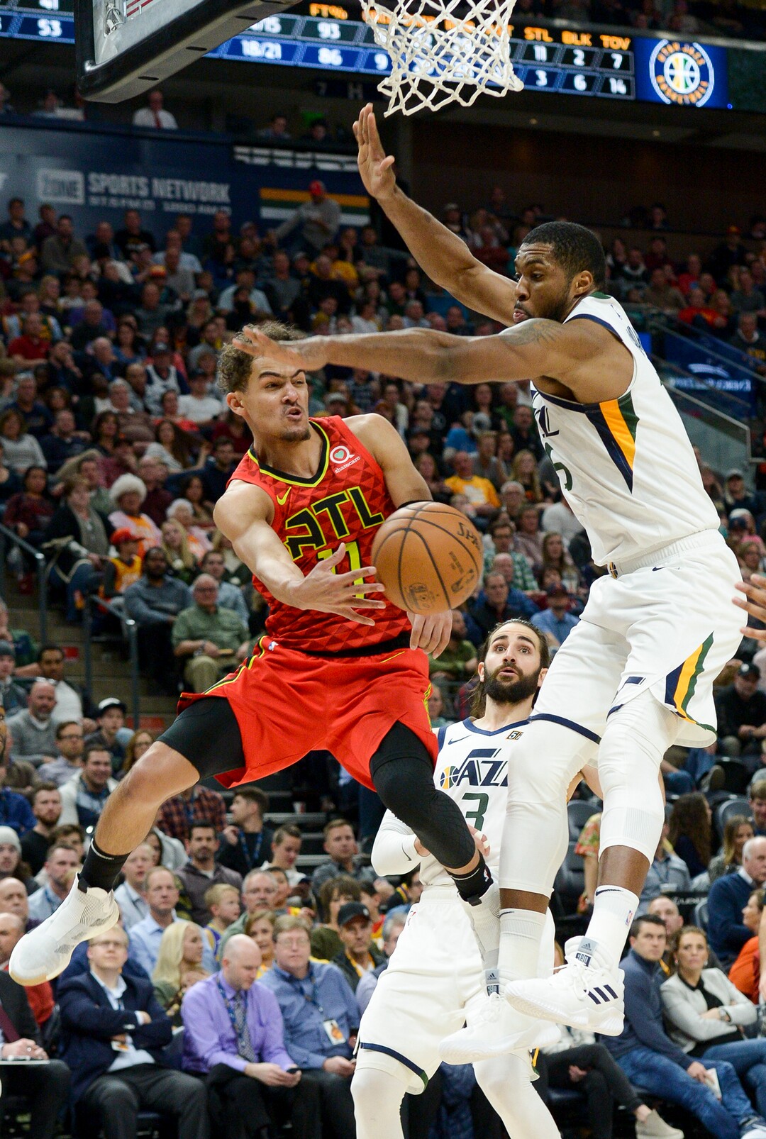 Leah Hogsten  |  The Salt Lake Tribune  Utah Jazz forward Derrick Favors (15) pressures Atlanta Hawks guard Trae Young (11). The Utah Jazz defeated the Atlanta Hawks, 128-112  at Vivint Smart Home Arena, Feb. 1, 2019. 