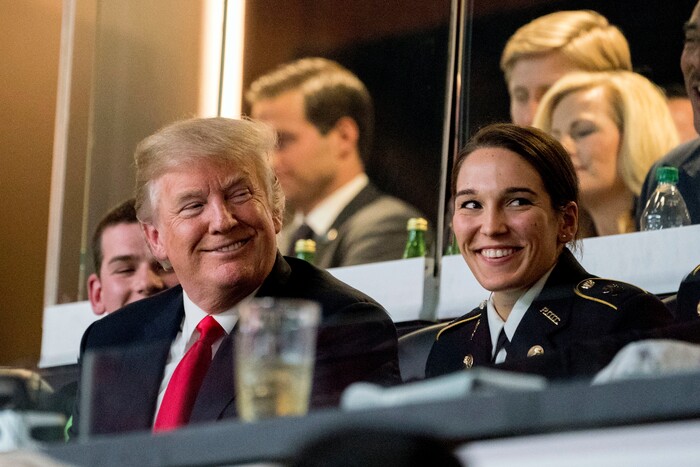 President Donald Trump smiles while watching the NCAA National Championship game at Mercedes-Benz Stadium, Monday, Jan. 8, 2018, in Atlanta, between Alabama and Georgia. (AP Photo/Andrew Harnik)