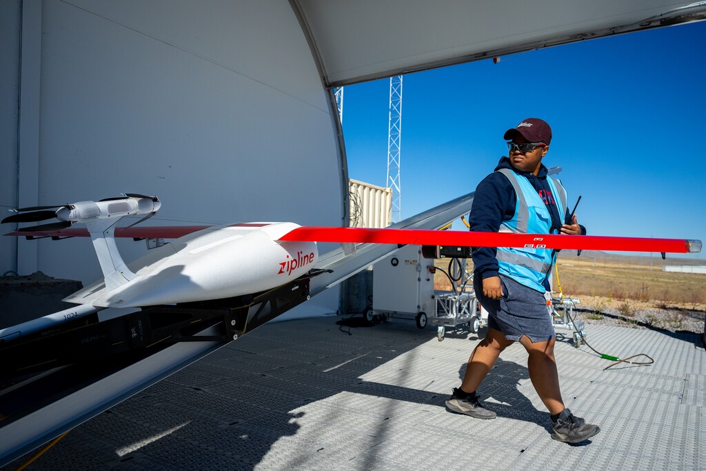 (Trent Nelson  |  The Salt Lake Tribune) Jada Connor checks a Zipline drone before a flight at the company's distribution center in South Jordan on Tuesday, Oct. 4, 2022. The Utah Legislature is revisiting regulations on drones as the sky grows more crowded with air deliveries.