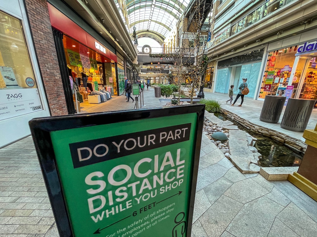 (Trent Nelson | The Salt Lake Tribune) A sign encouraging social distancing at City Creek in Salt Lake City on Tuesday, Nov. 24, 2020. With office workers, visitors and shoppers in downtown Salt Lake City still way down, businesses in the core are getting inventive on ways to draw customers for the holidays.
