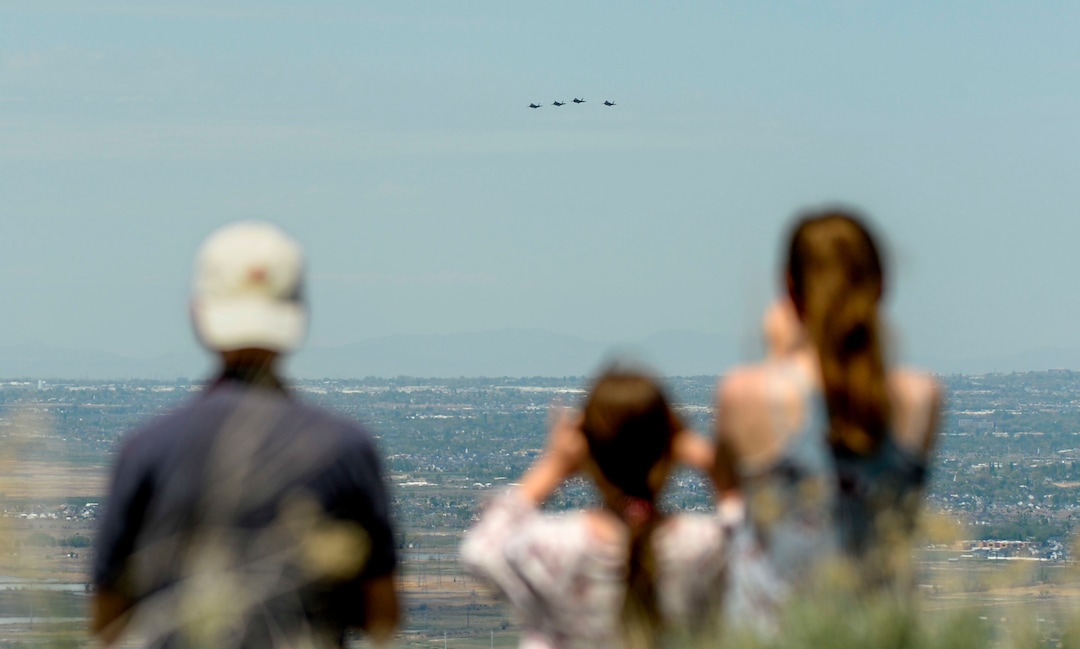 (Leah Hogsten  |  The Salt Lake Tribune) Onlookers lined Bountiful Blvd. to get a glimpse of the F-35Õs passing through Davis County.  In support of the healthcare workers, first responders and essential personnel on the front lines of the fight against COVID-19, Hill Air Force BaseÕs F-35 pilots from the Demo Team and the 388th Fighter Wing flew over the state, April 30, 2020.