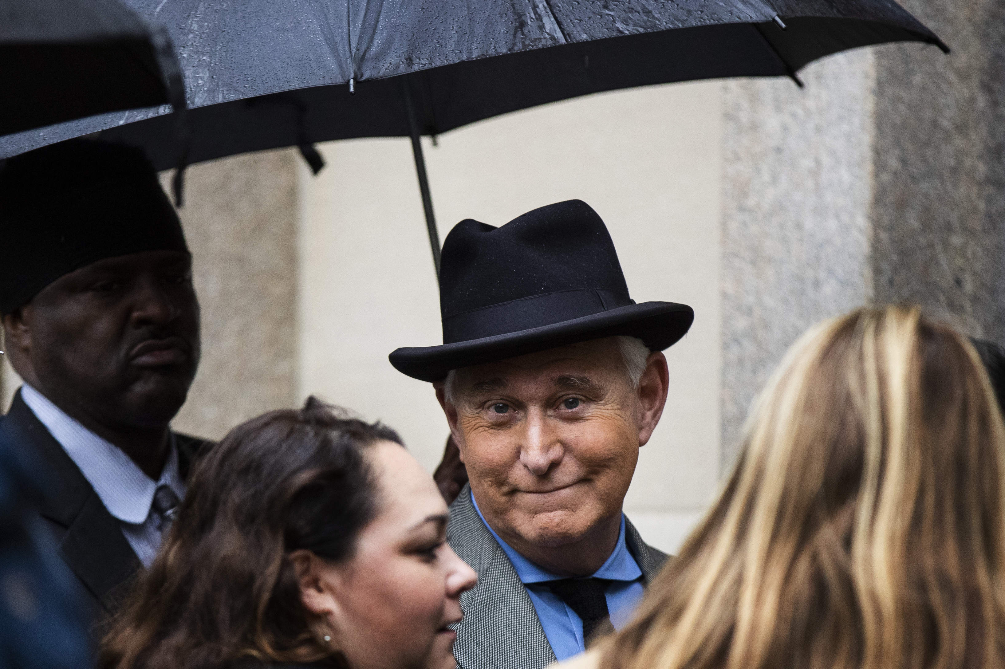 (Manuel Balce Ceneta | AP) In this Nov. 12, 2019 file photo, Roger Stone, a longtime Republican provocateur and former confidant of President Donald Trump, waits in line at the federal court in Washington. A Justice Department official tells the AP that the agency is backing away from its sentencing recommendation of between seven to nine years in prison for Trump confidant Roger Stone.