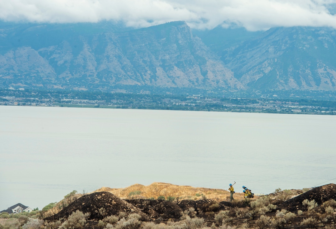 (Rick Egan  |  The Salt Lake Tribune)      Firefighters look for hotspots from the Knolls fire in Saratoga Springs near South Harrier Drive on Monday, June 29, 2020.