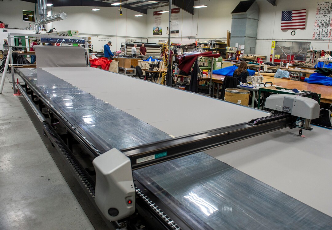 (Rick Egan  |  The Salt Lake Tribune)      Industrial cutting and sewing machines at SugarHouse Industries are cutting material for face masks and face shields, to protect against coronavirus, Thursday, March 26, 2020.