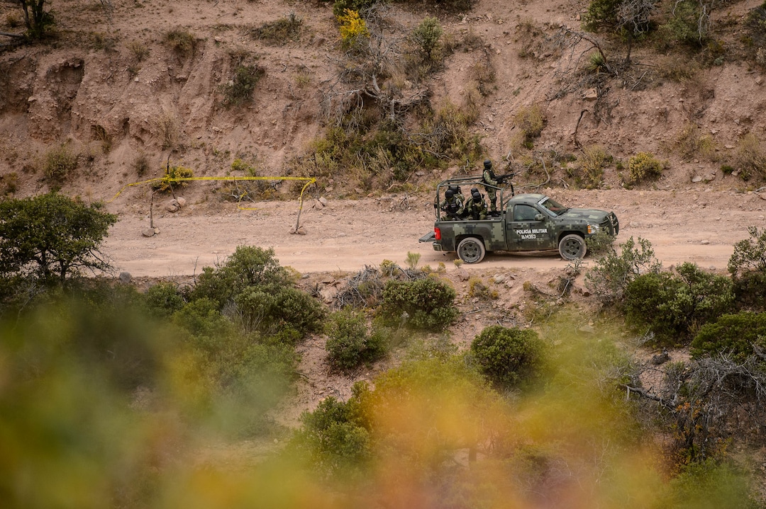 (Trent Nelson  |  The Salt Lake Tribune)A Mexican military vehicle passes the site where two vehicles were attacked by gunman, killing Dawna Ray Langford and Christina Marie Langford, along with two of Dawna's children (Trevor, 11, and Rogan, 3) near La Mora, Sonora on Friday Nov. 8, 2019.