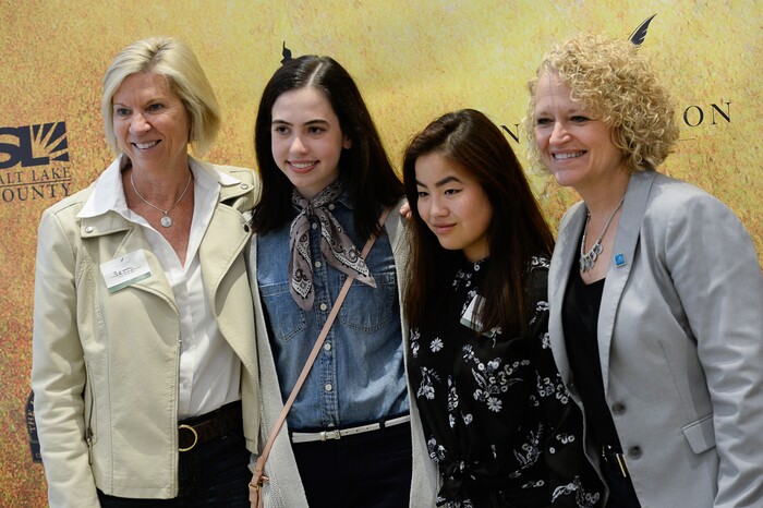 (Francisco Kjolseth  |  The Salt Lake Tribune)  Students Camille Whisenant, 18, center left, and Gracie Kilminster, 17, both seniors at Highland High get a chance to see Hamilton with Mayor Jackie Biskupski, at right, who was joined by her wife Betty on Thursday, April 19, 2018, at the Eccles Theater. As part of the New Nation Project, kids were challenged to write to politicians for the chance to win tickets and attend with a legislator or political leader of their choice as a way to educate them on a topics the teens care about.