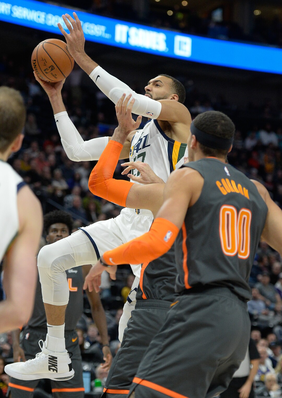 (Francisco Kjolseth  |  The Salt Lake Tribune) Utah Jazz center Rudy Gobert (27) pushes past the defense as the Utah Jazz host the Orlando Magic in their NBA basketball game at Vivint Smart Home Arena in Salt Lake City on Tuesday. Dec. 17, 2019.