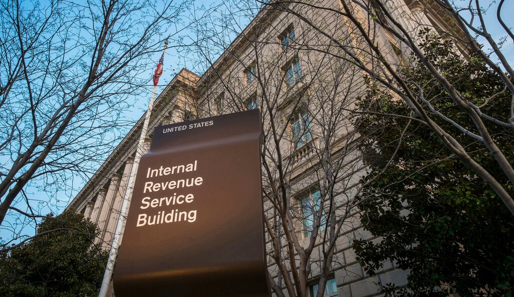 FILE - This April 13, 2014, file photo shows the Internal Revenue Service (IRS) headquarters building in Washington. President Donald Trump’s plan to provide massive tax breaks to corporations faces big challenges as Washington struggles with mounting debt and the populist president tries to make good on promises to bring jobs and prosperity to the middle class. (AP Photo/J. David Ake, File)